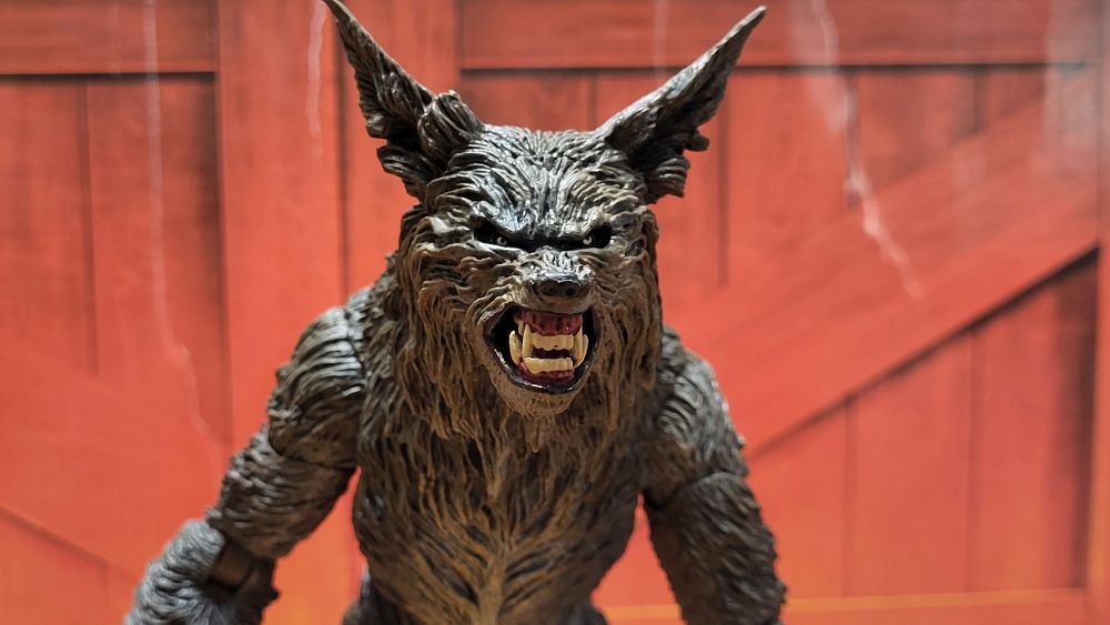 A closeup of the figure's closed mouth head on the figure, facing the camera.